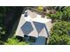 Aerial view showcases roof, trees, and backyard landscaping offering a sense of privacy at 5004 Lake Mist Se Dr, Mableton, GA 30126
