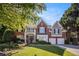 Beautiful two-story brick home featuring an attached two-car garage and a well-manicured lawn at 5004 Lake Mist Se Dr, Mableton, GA 30126