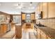 Bright kitchen featuring granite countertops, stainless steel appliances, and a breakfast nook at 5004 Lake Mist Se Dr, Mableton, GA 30126