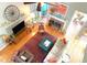 Bright living room with fireplace, hardwood floors, and comfortable seating at 5004 Lake Mist Se Dr, Mableton, GA 30126