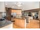 Modern kitchen featuring granite countertops, stainless steel appliances, and hardwood floors at 5004 Lake Mist Se Dr, Smyrna, GA 30126
