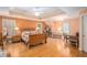 Large bedroom with sitting area, hardwood floors, tray ceiling and lots of natural light at 5004 Lake Mist Se Dr, Smyrna, GA 30126