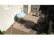 Paver patio with an umbrella-covered table and fire pit offers a relaxing outdoor space at 5004 Lake Mist Se Dr, Smyrna, GA 30126