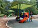 Colorful playground featuring slides, tunnels, and climbing structures at 5004 Lake Mist Se Dr, Smyrna, GA 30126