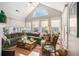 Cozy sun room with multiple windows, plants, and lots of light at 5004 Lake Mist Se Dr, Smyrna, GA 30126