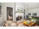 Inviting sunroom featuring a fireplace and ample seating for relaxation and entertaining at 5004 Lake Mist Se Dr, Smyrna, GA 30126