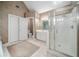 Bathroom featuring walk-in shower, double doors, large vanity, and neutral color walls at 5610 Mountain Meadow Ct, Stone Mountain, GA 30087