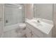 Cozy bathroom featuring a shower-tub combo and a white vanity at 5610 Mountain Meadow Ct, Stone Mountain, GA 30087