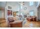Bright living room with vaulted ceilings, fireplace, and hardwood floors at 5610 Mountain Meadow Ct, Stone Mountain, GA 30087