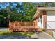A cozy, wood-stained back deck overlooks the yard of this brick home at , Mableton, GA 30126