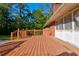 View of the property's back deck and brick house exterior at , Mableton, GA 30126