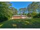 A wide view of the brick house and yard at , Mableton, GA 30126