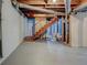 Spacious basement with exposed ceiling and wooden stairway at , Mableton, GA 30126