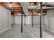 Spacious unfinished basement with exposed ceiling, support beams, and concrete floor at , Mableton, GA 30126