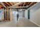 Unfinished basement with exposed pipes, ductwork, and a laundry area at , Mableton, GA 30126
