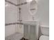 Modern bathroom with a tiled shower, a sink, and a toilet at , Mableton, GA 30126