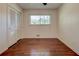 Bedroom with a ceiling fan, a window, and hardwood floors at , Mableton, GA 30126