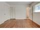 Bedroom with hardwood floors, a window, and a closet at , Mableton, GA 30126