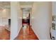 Hallway showing hardwood floors leading to kitchen and living room at , Mableton, GA 30126