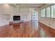 Bright living room featuring hardwood floors, a fireplace, and large windows at , Mableton, GA 30126