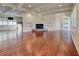 Open-concept living room with hardwood floors, fireplace, and ample natural light at , Mableton, GA 30126