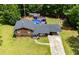 Aerial view of home, showcasing the backyard with a refreshing in-ground pool and spacious deck area at 173 Avalon Way, Riverdale, GA 30274