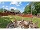 The backyard features a custom fire pit, perfect for outdoor entertaining and cozy evenings at 173 Avalon Way, Riverdale, GA 30274