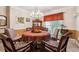 Elegant dining room featuring a chandelier, traditional furniture and a charming window at 1820 Habersham Gate Dr, Cumming, GA 30041