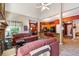 View of the living room and kitchen area with bar stool seating at the counter at 1820 Habersham Gate Dr, Cumming, GA 30041