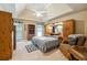 Large main bedroom with ample closet space and overhead fan at 1820 Habersham Gate Dr, Cumming, GA 30041
