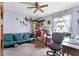Bedroom featuring a ceiling fan, neutral carpet, and light purple walls at 4720 Bill Cheek Rd, Auburn, GA 30011