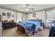Cozy bedroom featuring a comfortable bed and carpeted floors at 4720 Bill Cheek Rd, Auburn, GA 30011