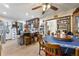 Inviting kitchen with wood floors, and a view of the table and dining area at 4720 Bill Cheek Rd, Auburn, GA 30011