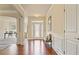 Welcoming entryway features hardwood floors, decorative molding, and a glass-paneled front door, creating a grand entrance at 6805 Bransford Dr, Cumming, GA 30040