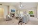 Spacious living room with a stone fireplace, vaulted ceilings, and comfortable seating area at 6805 Bransford Dr, Cumming, GA 30040