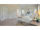Neutral main bedroom showcasing decor, plush bedding, and natural light at 6805 Bransford Dr, Cumming, GA 30040