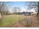 Spacious backyard with a cozy fire pit and garden, ideal for outdoor gatherings at 170 Gilreath Nw Rd, Cartersville, GA 30121