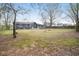 Large backyard features a partially fenced yard and ample space for outdoor activities at 170 Gilreath Nw Rd, Cartersville, GA 30121