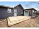 Home's backyard features a wooden deck, new patio and a sunroom, great for outdoor living at 170 Gilreath Nw Rd, Cartersville, GA 30121