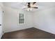 Empty bedroom features hardwood flooring and window with natural light at 170 Gilreath Nw Rd, Cartersville, GA 30121