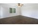 Bedroom features hardwood flooring and large double hung windows at 170 Gilreath Nw Rd, Cartersville, GA 30121