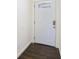 Bright entryway featuring a white door with decorative glass and wood flooring at 170 Gilreath Nw Rd, Cartersville, GA 30121