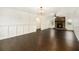 Spacious living room with hardwood floors and a stone fireplace at 170 Gilreath Nw Rd, Cartersville, GA 30121