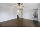 Spacious main bedroom with dark hardwood flooring, en-suite bathroom and ceiling fan at 170 Gilreath Nw Rd, Cartersville, GA 30121