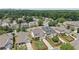 An aerial view of a suburban neighborhood showcasing manicured lawns and houses nestled amongst mature trees at 1840 Brighton Se Blvd, Atlanta, GA 30316