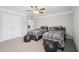 This large bedroom has two twin beds, neutral walls, and multiple walk-in closets at 1840 Brighton Se Blvd, Atlanta, GA 30316