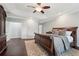 Bright bedroom showcasing tray ceilings, hardwood floors, and patterned area rug at 1840 Brighton Se Blvd, Atlanta, GA 30316