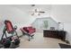 This bonus room features a home gym and office setup, all in one space at 1840 Brighton Se Blvd, Atlanta, GA 30316