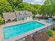 An aerial view of a community pool with a mushroom water feature and pool house at 1840 Brighton Se Blvd, Atlanta, GA 30316