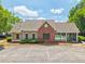 Community pool area featuring a clubhouse, gated pool, and ample parking for residents and guests at 1840 Brighton Se Blvd, Atlanta, GA 30316